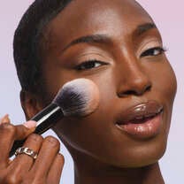 Apply Set it Bright Powder with Pointed Powder Brush
